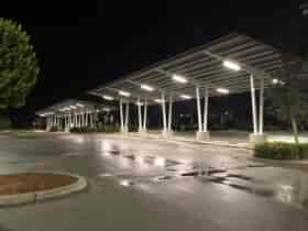 Solar Parking Structures provide shade and solar powered night time lighting in the parking lot of the Naples Zoo in Florida.