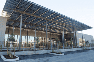 Solar Canopy with glass-glass solar panels covers the entryway at the Pastoria Building in California.