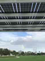LSX Solar Panels are weatherproof and translucent, providing shade and solar power for this FPL Solar Canopy project.