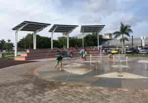 Solarscapes LSX Solar Module System provides shade and solar power for the children playing in the fountains at Laishley Park