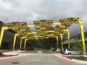 Architectural Solar canopy parking structure covers the Springdale General Artist Space