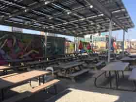 Solar Canopy with LSX translucent solar panels cover the seating area at Brewery Emperial.