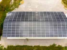 Solar Panels cover the Canopy structure provides shade and solar power for this Community Space as seen from this aerial view.