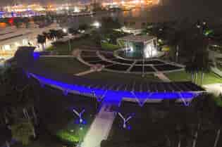 LSX Curved SolarScape lit in colored lights from an aerial view of Miami Bayfront Park at Night