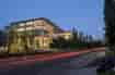 View of Solar Panel Awning over outdoor student area between buildings at night