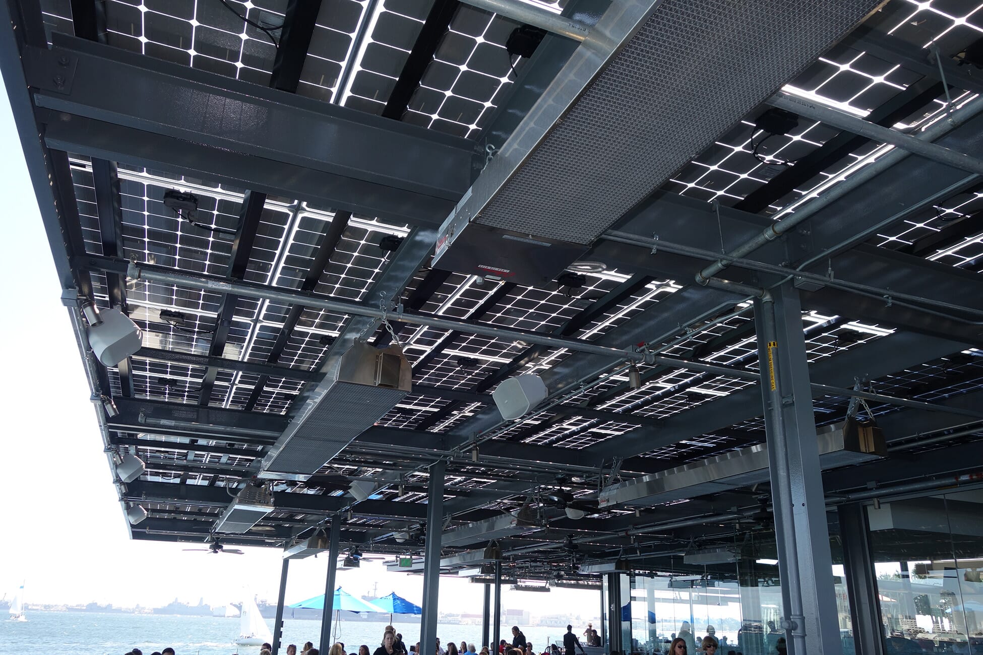 Solar Canopy with LSX Frameless Solar Module provides shade and solar power for guests at Coasterra Restaurant.