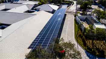 Ariel view of a long solar canopy at Gulliver Academy in Florida